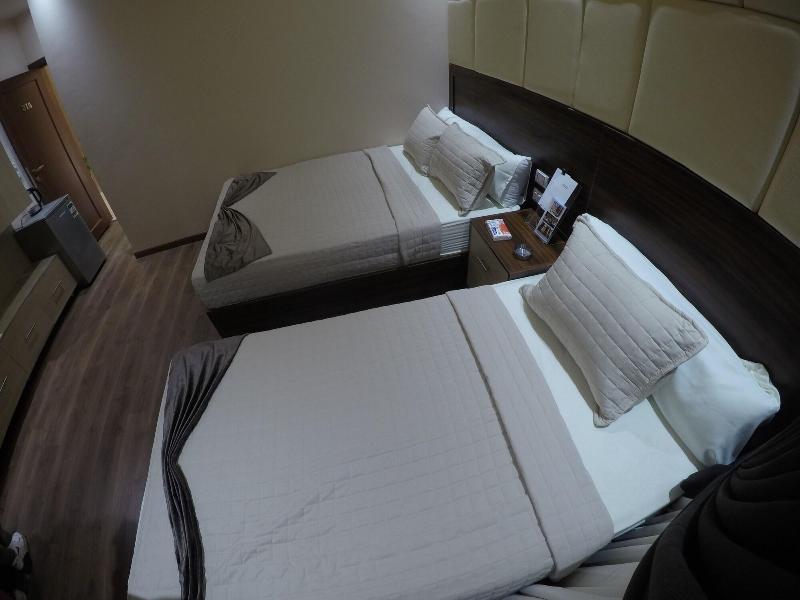 Grand City Hotel - Oda