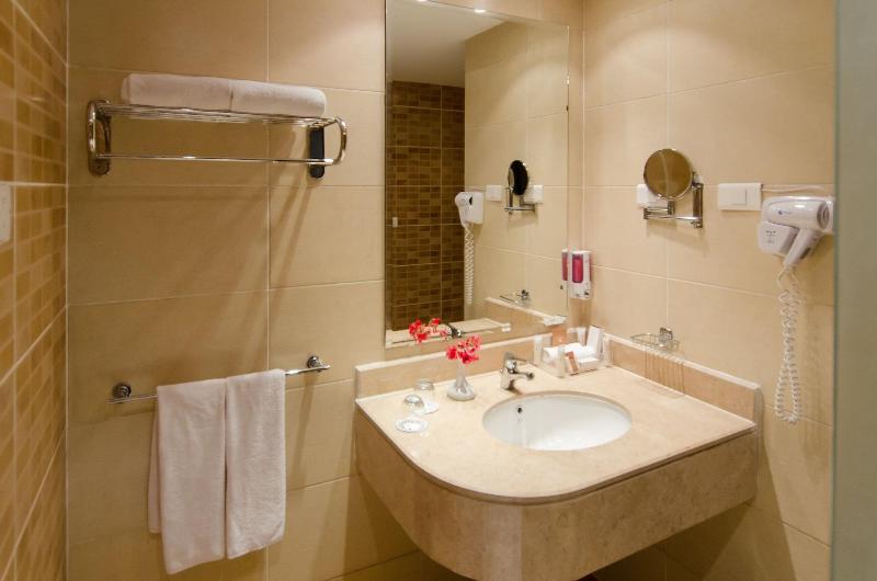 Teda Swiss Inn Plaza Hotel - Oda