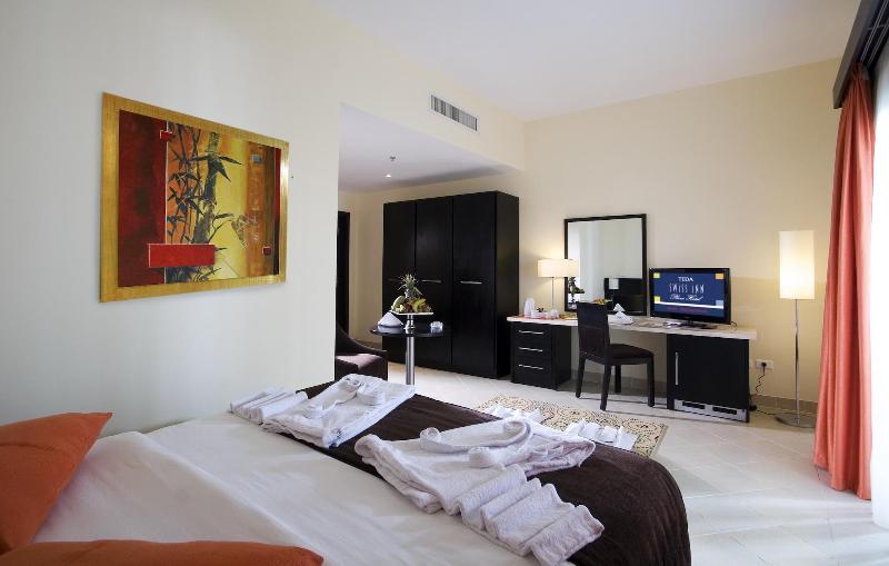 Teda Swiss Inn Plaza Hotel - Oda