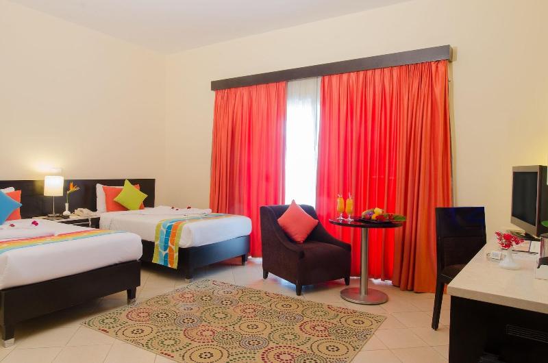Teda Swiss Inn Plaza Hotel - Oda