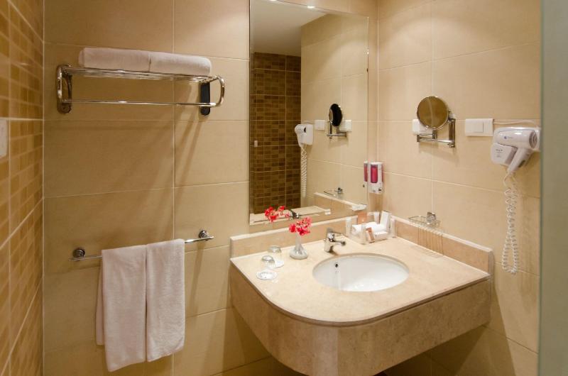 Teda Swiss Inn Plaza Hotel - Oda