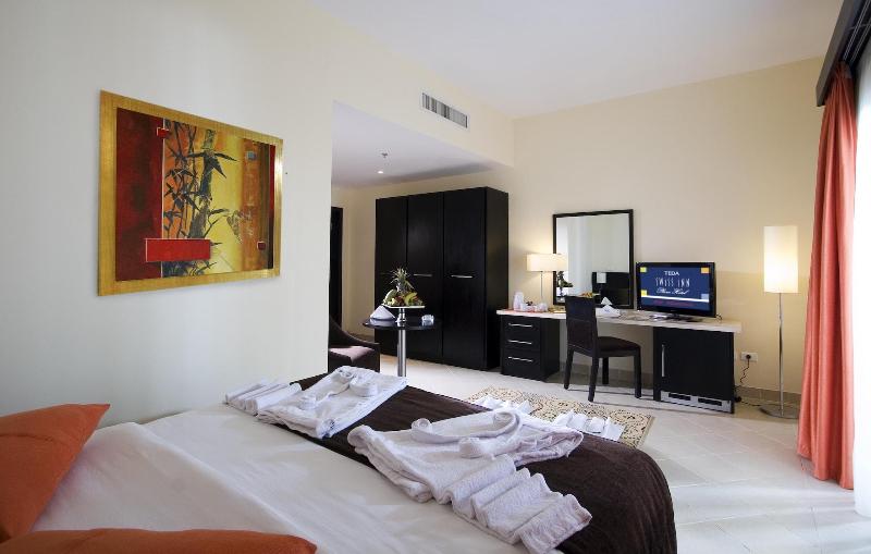 Teda Swiss Inn Plaza Hotel - Oda