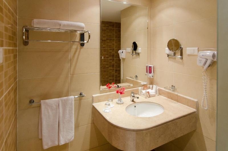 Teda Swiss Inn Plaza Hotel - Oda