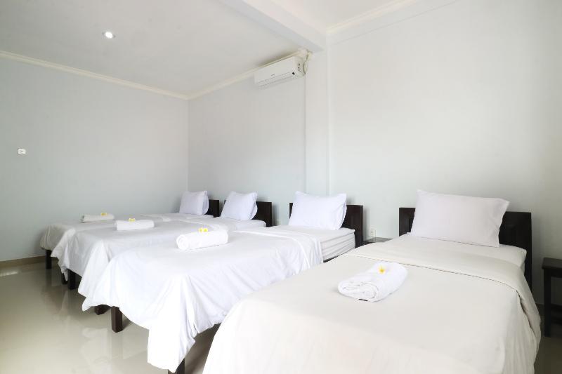 The Wina Echo Beach Guesthouse by ZUZU - Oda