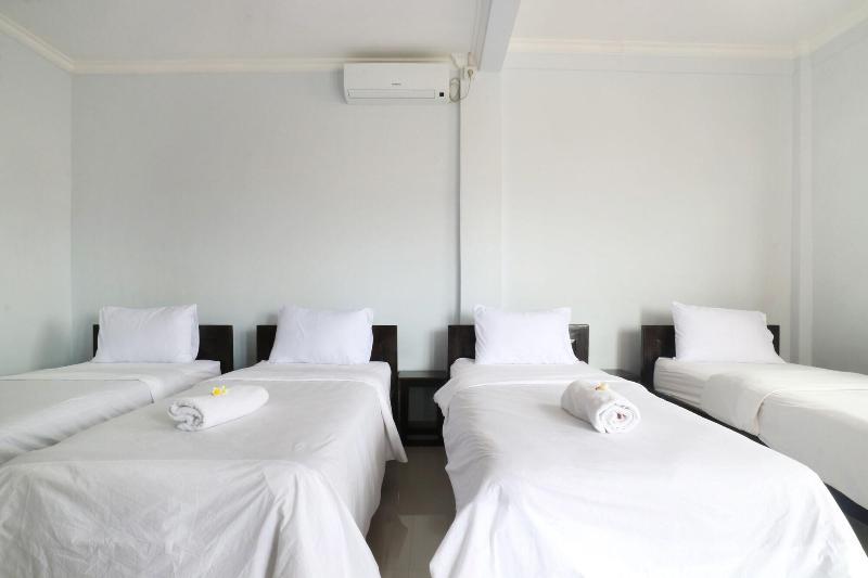 The Wina Echo Beach Guesthouse by ZUZU - Oda