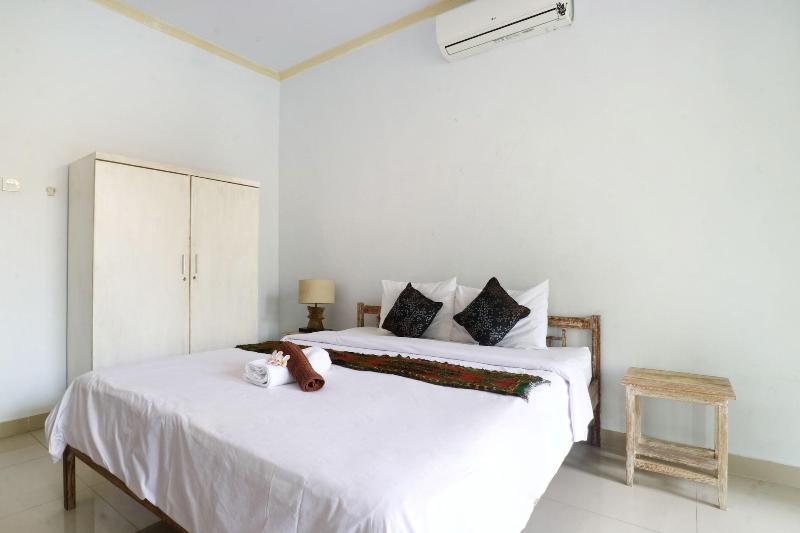 The Wina Echo Beach Guesthouse by ZUZU - Oda