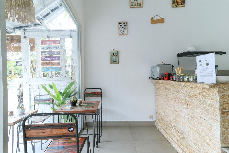 The Wina Echo Beach Guesthouse by ZUZU - Restoran