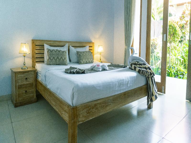 The Wina Guesthouse 2 by ZUZU - Oda