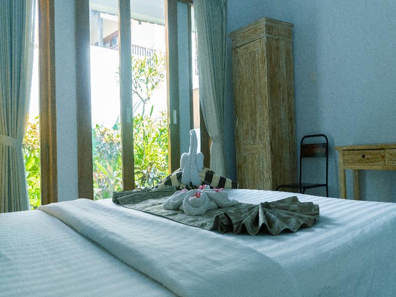 The Wina Guesthouse 2 by ZUZU - Oda