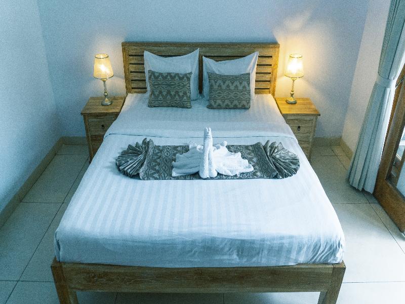 The Wina Guesthouse 2 by ZUZU - Oda