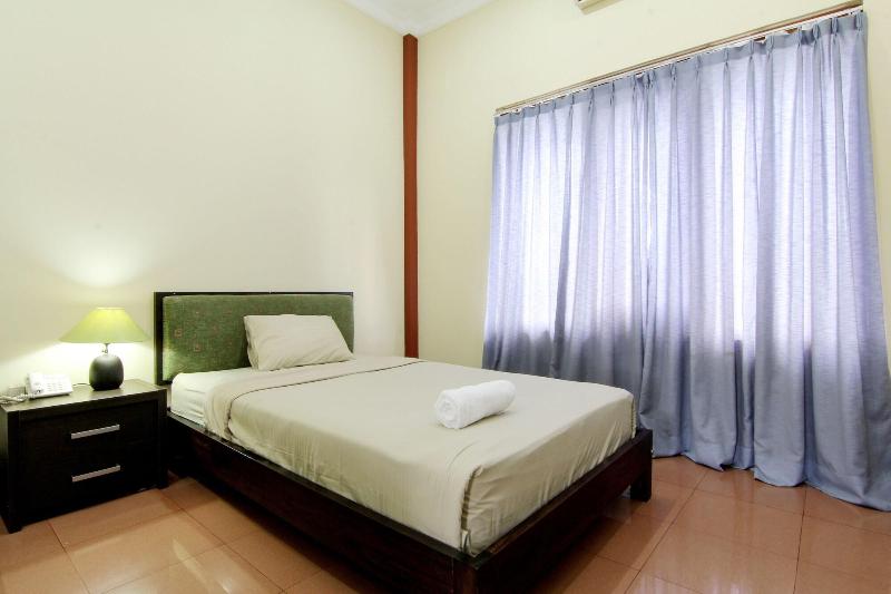 Hotel Tiger Yogyakarta by ZUZU - Oda