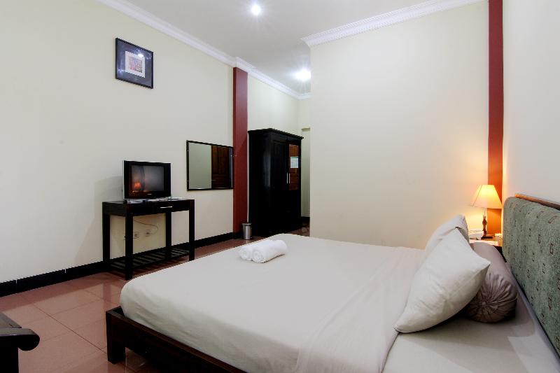 Hotel Tiger Yogyakarta by ZUZU - Oda