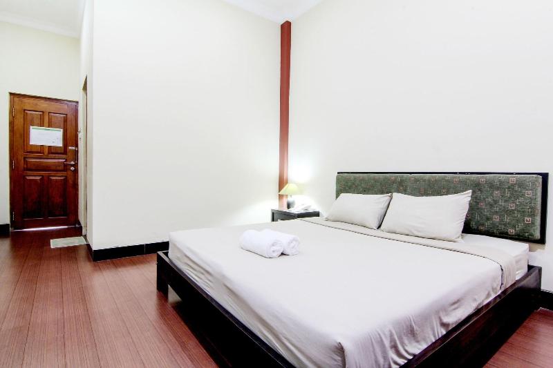 Hotel Tiger Yogyakarta by ZUZU - Oda
