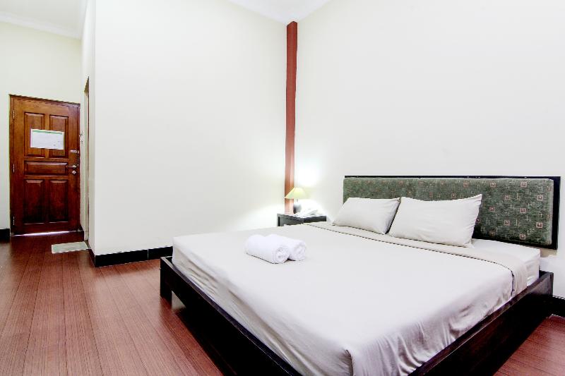 Hotel Tiger Yogyakarta by ZUZU - Oda
