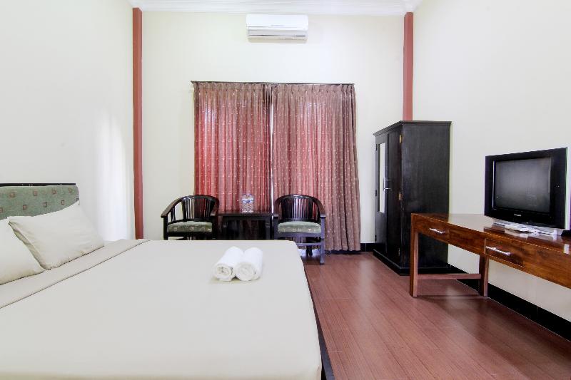 Hotel Tiger Yogyakarta by ZUZU - Oda