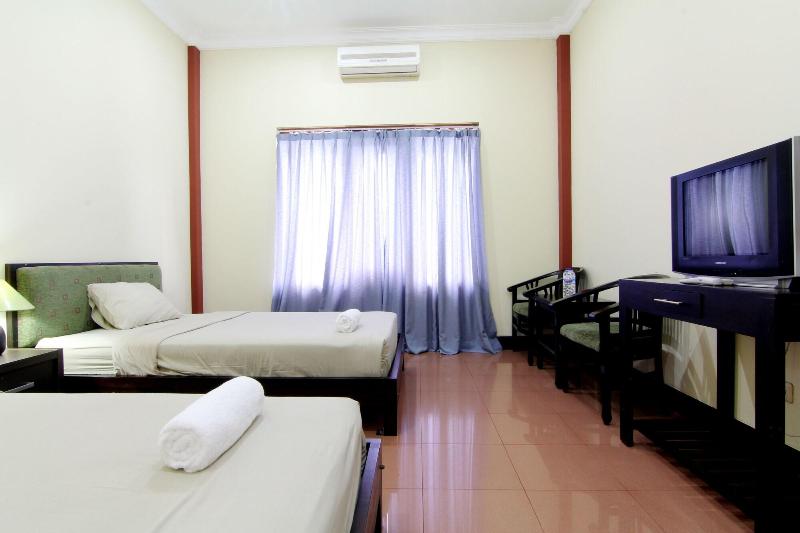 Hotel Tiger Yogyakarta by ZUZU - Oda
