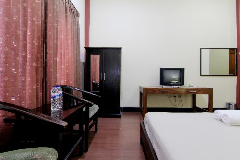 Hotel Tiger Yogyakarta by ZUZU - Oda