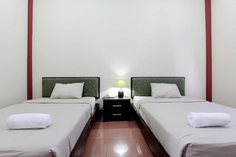 Hotel Tiger Yogyakarta by ZUZU - Oda