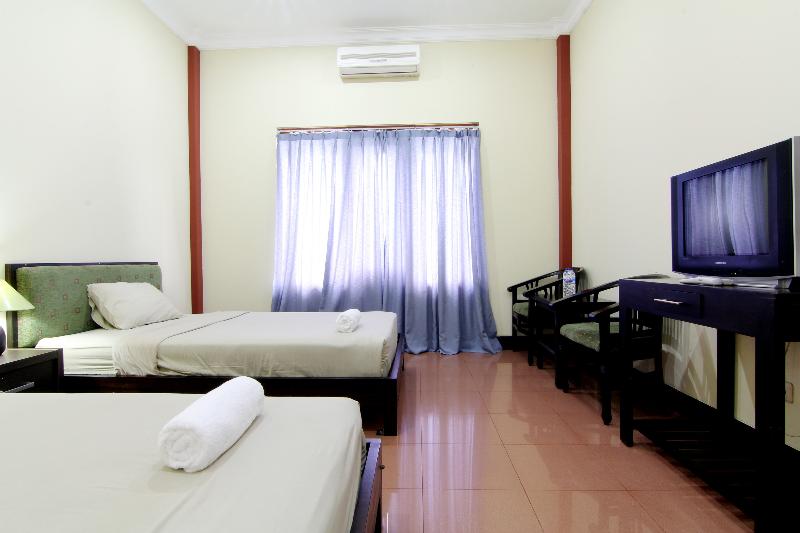 Hotel Tiger Yogyakarta by ZUZU - Oda