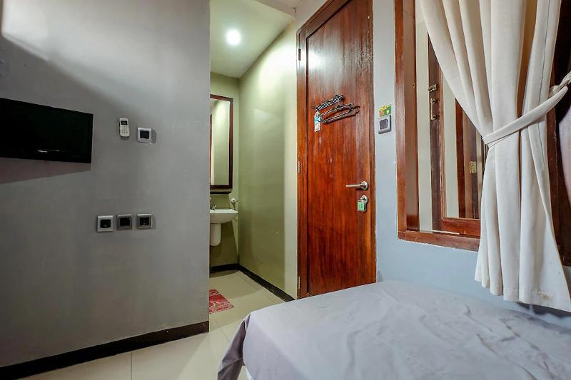 Buminanienie Guesthouse Bandung by ZUZU - Oda