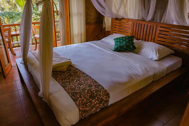 Puri Sunny Guesthouse - Oda