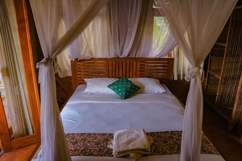 Puri Sunny Guesthouse - Oda