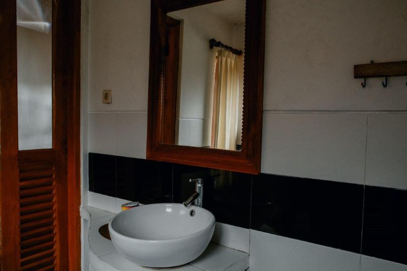 Puri Sunny Guesthouse - Oda