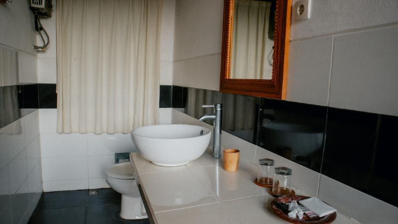 Puri Sunny Guesthouse - Oda