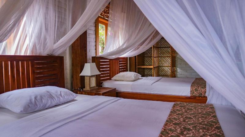 Puri Sunny Guesthouse - Oda