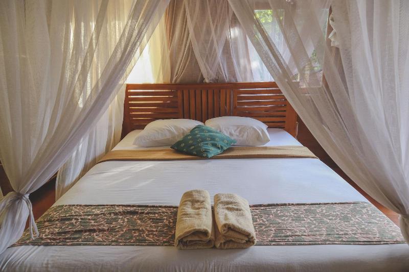 Puri Sunny Guesthouse - Oda