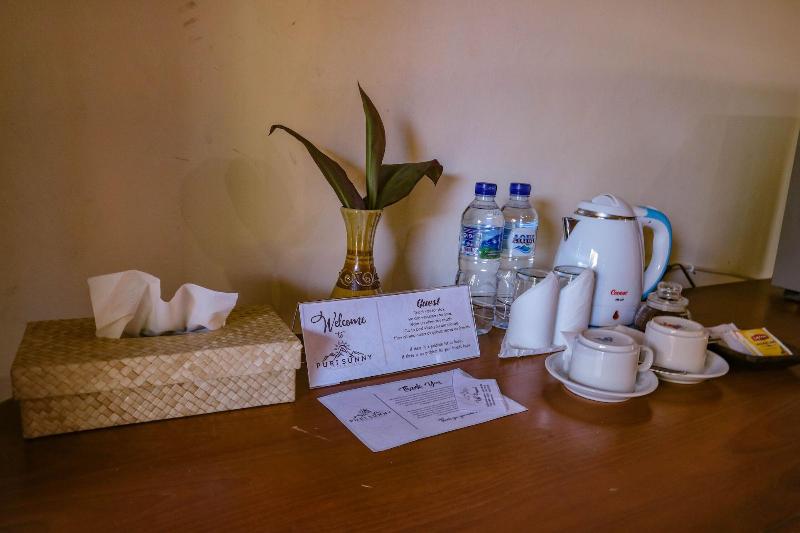 Puri Sunny Guesthouse - Oda