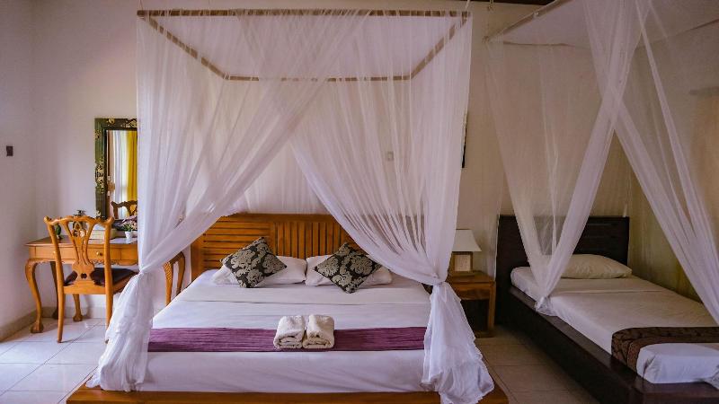 Puri Sunny Guesthouse - Oda