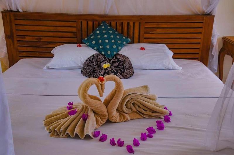 Puri Sunny Guesthouse - Oda