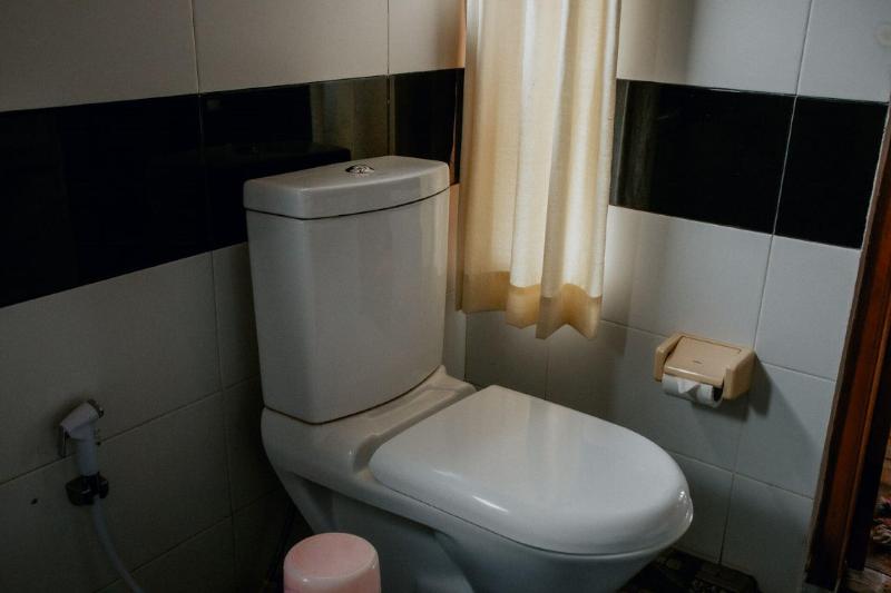 Puri Sunny Guesthouse - Oda