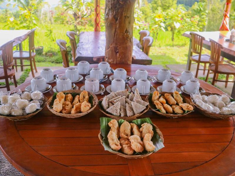 Puri Sunny Guesthouse - Restoran