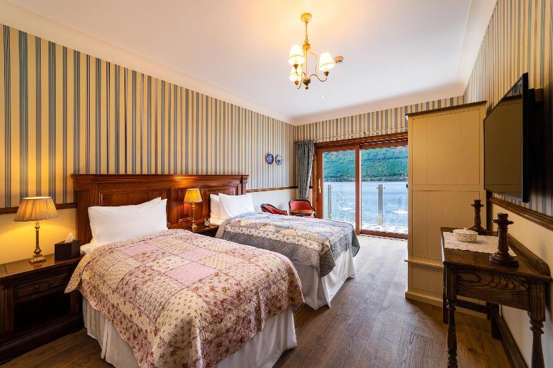 The Whispering Pine Lodge - Oda