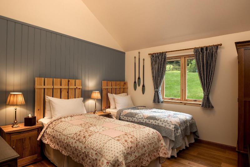 The Whispering Pine Lodge - Oda
