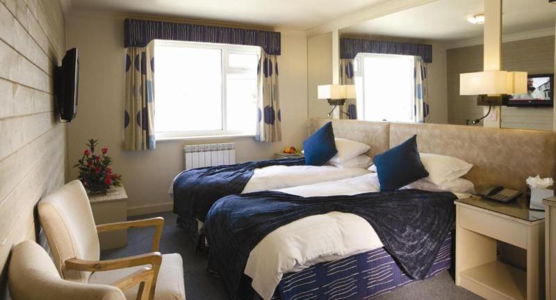Cobo Bay Hotel - Oda