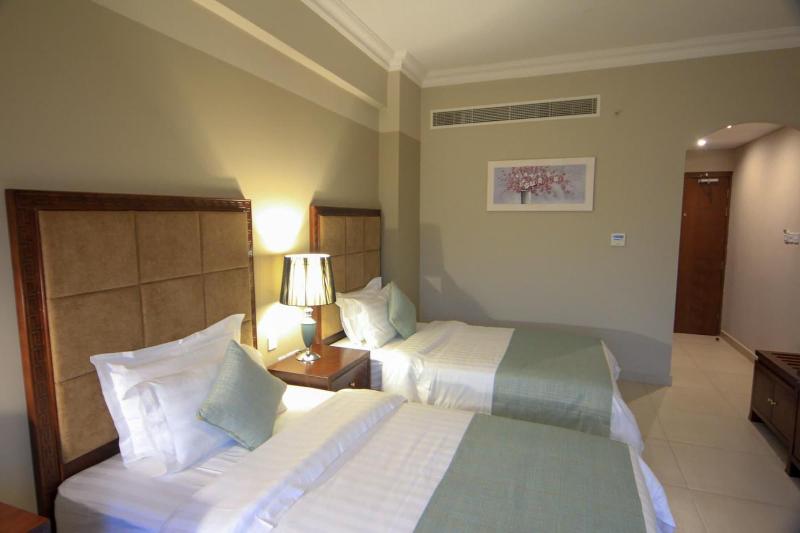 Muscat Inn Hotel - Oda