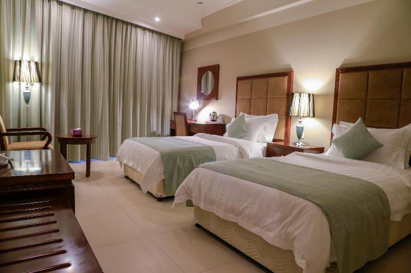 Muscat Inn Hotel - Oda