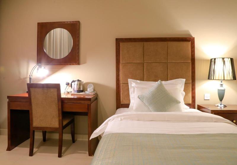 Muscat Inn Hotel - Oda