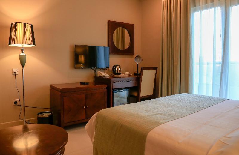 Muscat Inn Hotel - Oda