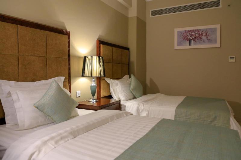 Muscat Inn Hotel - Oda