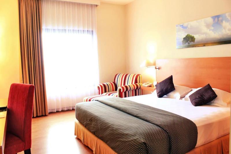 Lux Tychi Hotel Malang by ZUZU - Oda