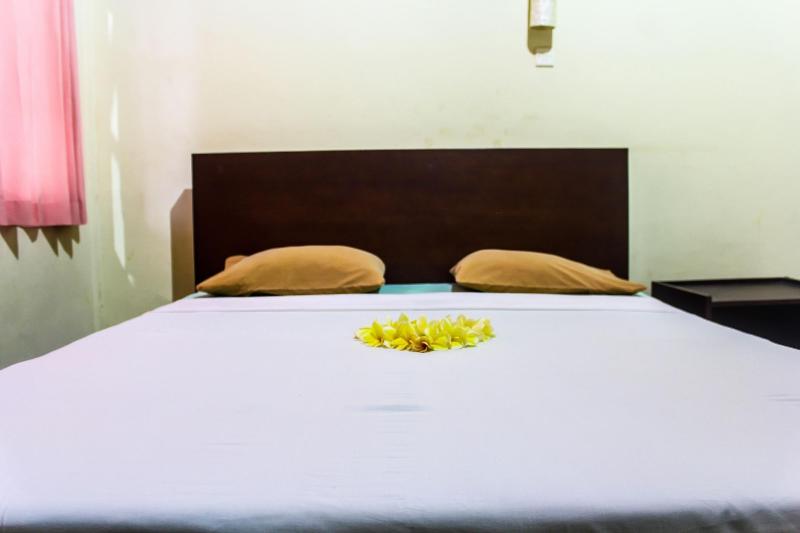 Budhi Beach Inn - Oda