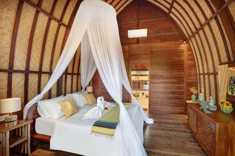 Uluwatu Lumbung Cottages - Oda
