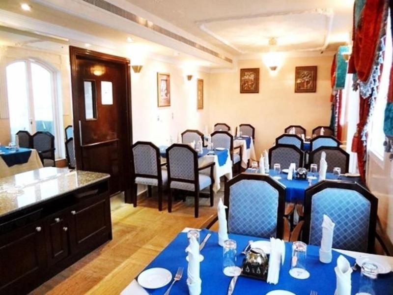 OYO 137 Marina Hotel - Restoran