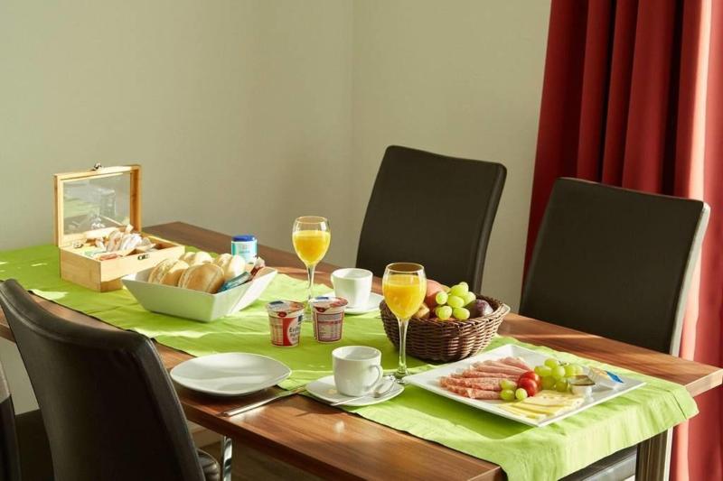Business Homes - Das Apartment Hotel - Restoran