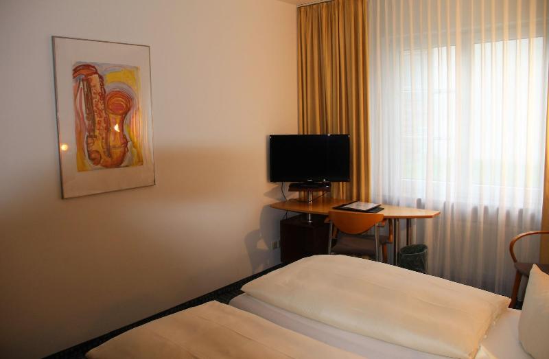 Check Inn Hotel - Oda