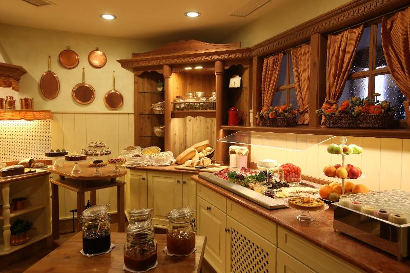 Alpen Suite Hotel - Restoran